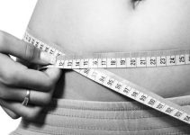 Womam Measuring Belly Size